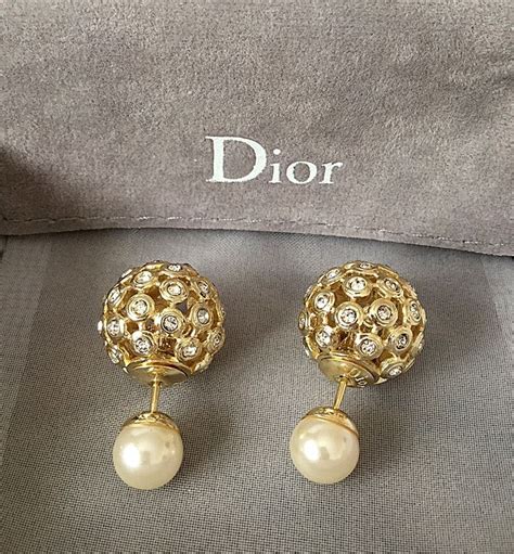 christian dior tribal earrings price.